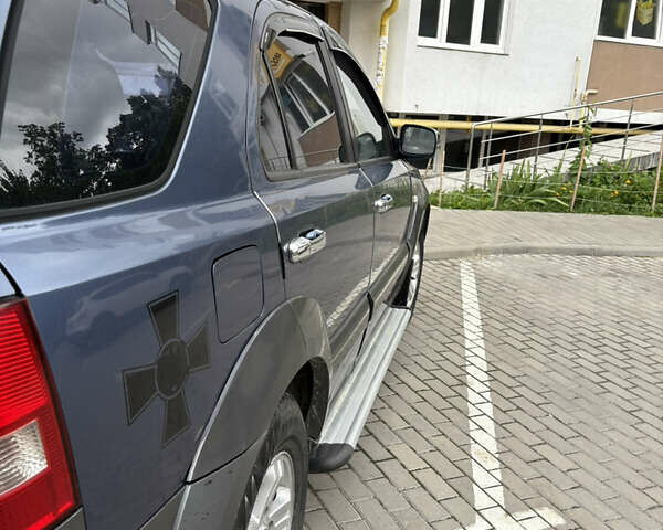 Синій Кіа Соренто, об'ємом двигуна 2.5 л та пробігом 250 тис. км за 5300 $, фото 4 на Automoto.ua