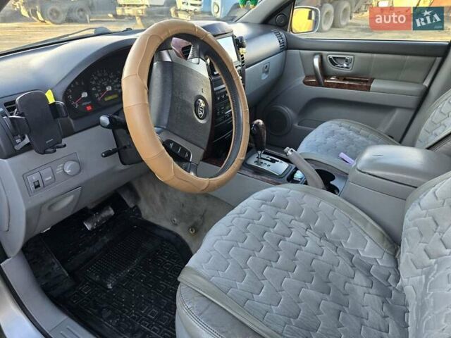 Синий Киа Соренто, объемом двигателя 2.5 л и пробегом 276 тыс. км за 3800 $, фото 7 на Automoto.ua