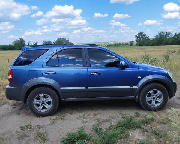 Синий Киа Соренто, объемом двигателя 2.5 л и пробегом 397 тыс. км за 7800 $, фото 1 на Automoto.ua