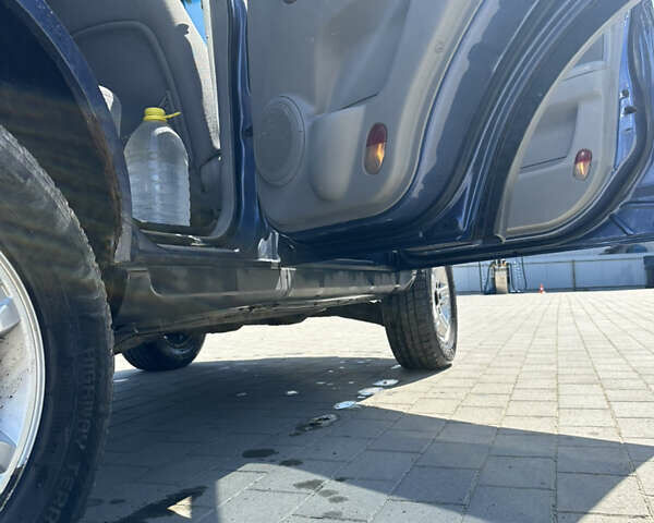 Синий Киа Соренто, объемом двигателя 2.4 л и пробегом 240 тыс. км за 5100 $, фото 5 на Automoto.ua