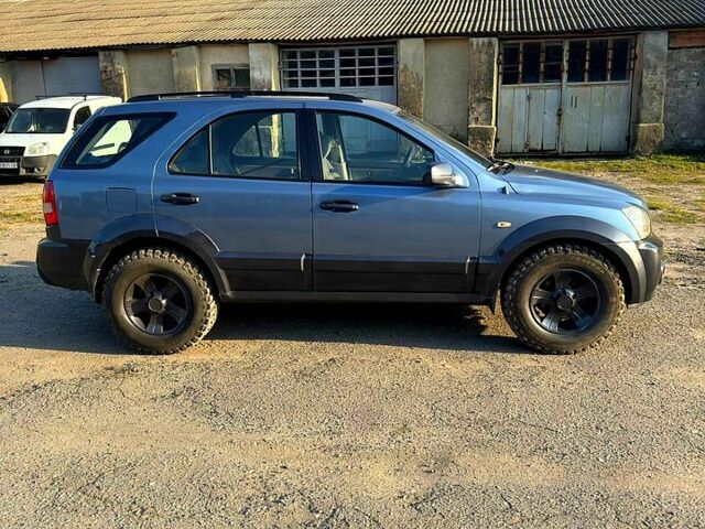 Синий Киа Соренто, объемом двигателя 2.5 л и пробегом 244 тыс. км за 3700 $, фото 2 на Automoto.ua