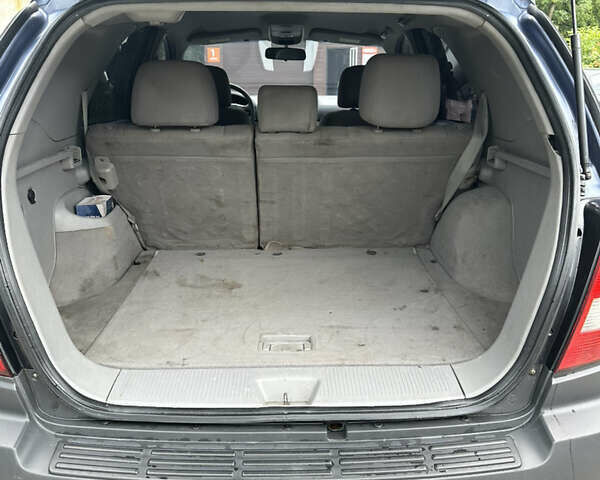 Синий Киа Соренто, объемом двигателя 2.4 л и пробегом 240 тыс. км за 5100 $, фото 11 на Automoto.ua