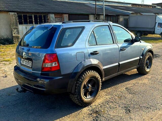 Синий Киа Соренто, объемом двигателя 2.5 л и пробегом 244 тыс. км за 3700 $, фото 1 на Automoto.ua