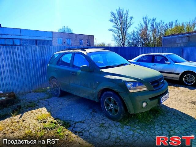 Синий Киа Соренто, объемом двигателя 2.5 л и пробегом 180 тыс. км за 4000 $, фото 1 на Automoto.ua