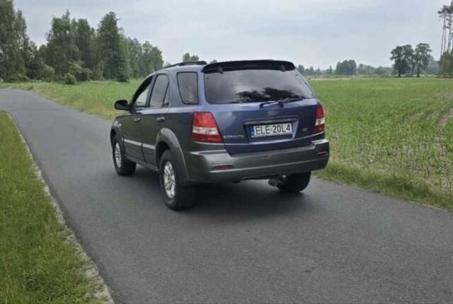 Синій Кіа Соренто, об'ємом двигуна 2.5 л та пробігом 177 тис. км за 3850 $, фото 1 на Automoto.ua