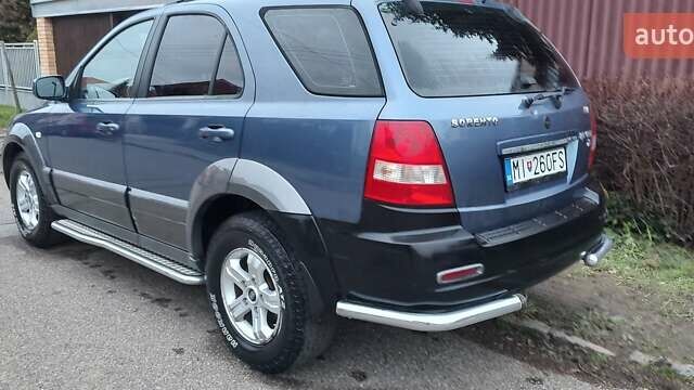 Синій Кіа Соренто, об'ємом двигуна 2.5 л та пробігом 215 тис. км за 6465 $, фото 1 на Automoto.ua