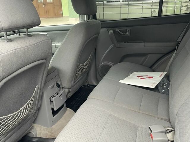 Синий Киа Соренто, объемом двигателя 2.5 л и пробегом 400 тыс. км за 4527 $, фото 11 на Automoto.ua