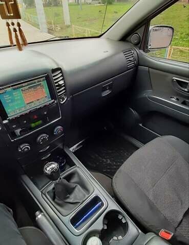 Синий Киа Соренто, объемом двигателя 2.5 л и пробегом 230 тыс. км за 9200 $, фото 2 на Automoto.ua