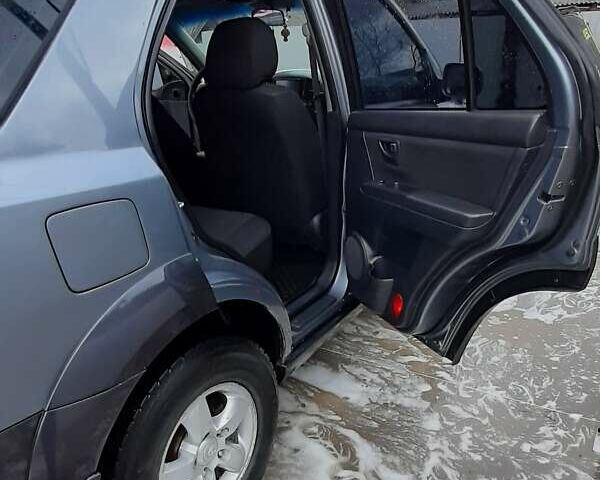 Синий Киа Соренто, объемом двигателя 2.5 л и пробегом 230 тыс. км за 9200 $, фото 4 на Automoto.ua