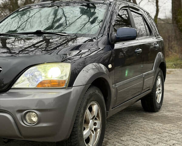 Синий Киа Соренто, объемом двигателя 2.5 л и пробегом 250 тыс. км за 8350 $, фото 2 на Automoto.ua