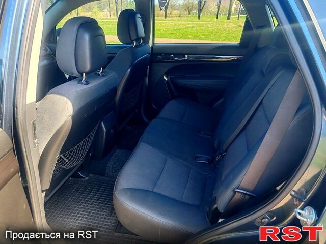 Синий Киа Соренто, объемом двигателя 2.4 л и пробегом 0 тыс. км за 9500 $, фото 3 на Automoto.ua