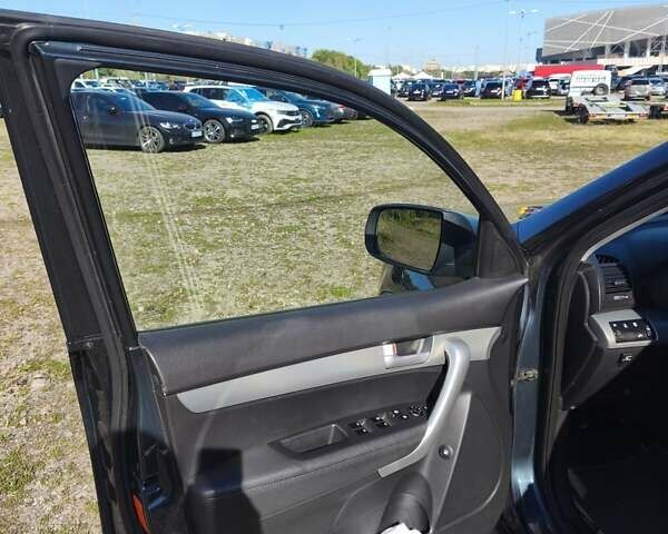 Синій Кіа Соренто, об'ємом двигуна 2.4 л та пробігом 217 тис. км за 10900 $, фото 20 на Automoto.ua