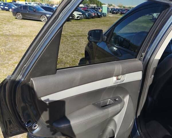 Синій Кіа Соренто, об'ємом двигуна 2.4 л та пробігом 217 тис. км за 10900 $, фото 21 на Automoto.ua