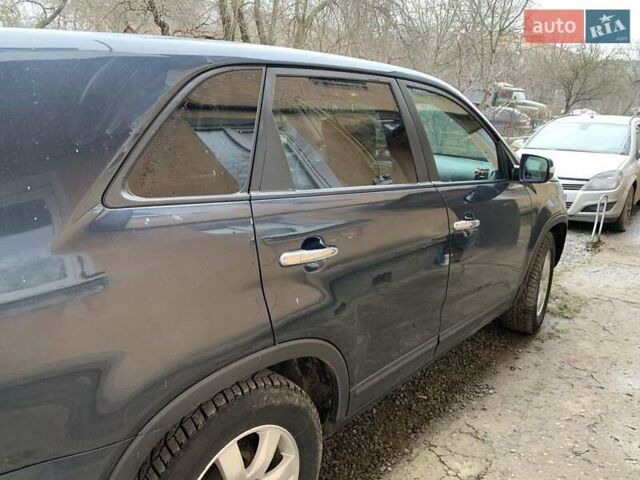 Синий Киа Соренто, объемом двигателя 2.4 л и пробегом 168 тыс. км за 10800 $, фото 3 на Automoto.ua