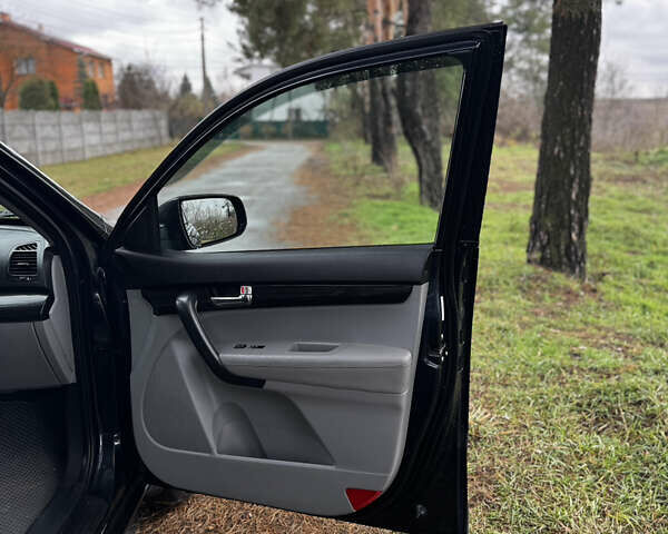 Синий Киа Соренто, объемом двигателя 2.4 л и пробегом 147 тыс. км за 11900 $, фото 9 на Automoto.ua