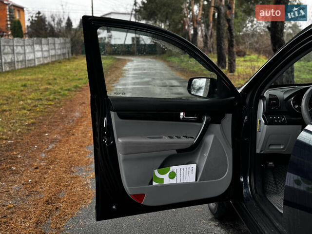 Синий Киа Соренто, объемом двигателя 2.4 л и пробегом 147 тыс. км за 11900 $, фото 8 на Automoto.ua