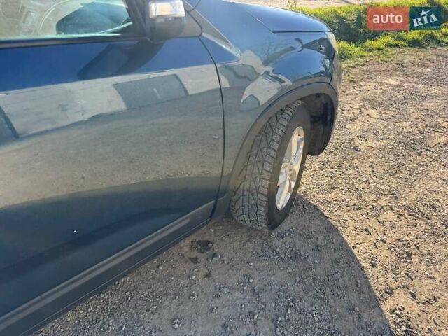 Синий Киа Соренто, объемом двигателя 2.35 л и пробегом 165 тыс. км за 12000 $, фото 1 на Automoto.ua