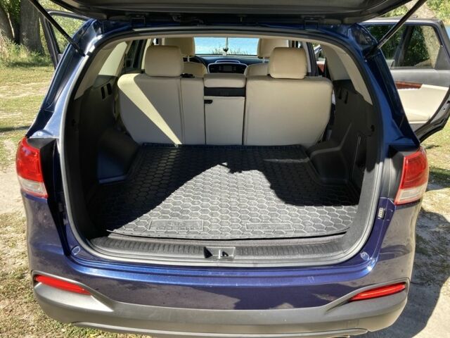 Синий Киа Соренто, объемом двигателя 2.4 л и пробегом 94 тыс. км за 16000 $, фото 13 на Automoto.ua