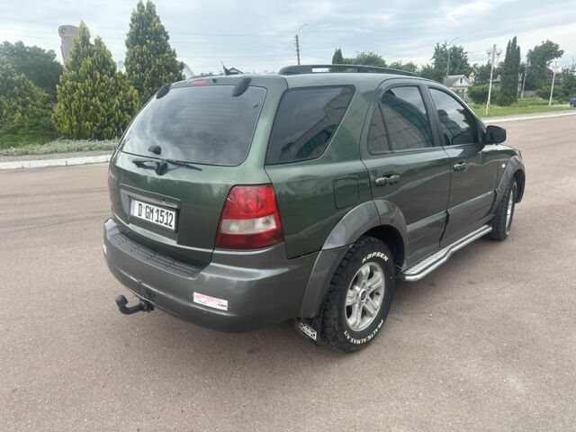 Зеленый Киа Соренто, объемом двигателя 2.5 л и пробегом 350 тыс. км за 4500 $, фото 3 на Automoto.ua