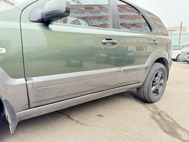 Зеленый Киа Соренто, объемом двигателя 2.5 л и пробегом 300 тыс. км за 3750 $, фото 11 на Automoto.ua