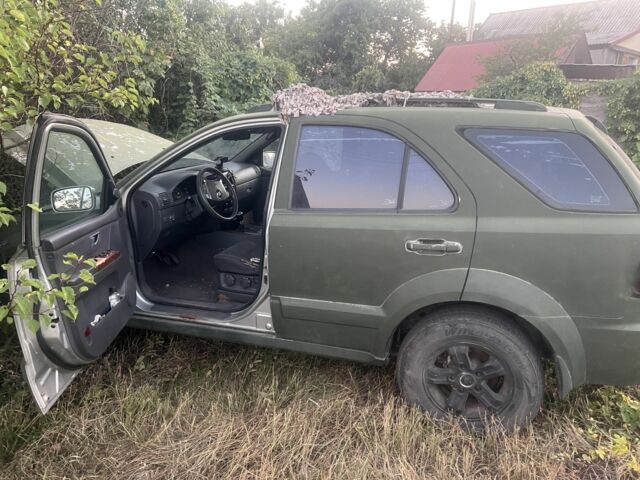 Зеленый Киа Соренто, объемом двигателя 2.5 л и пробегом 280 тыс. км за 1909 $, фото 4 на Automoto.ua