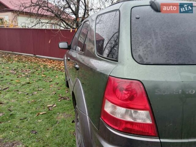 Зеленый Киа Соренто, объемом двигателя 2.5 л и пробегом 340 тыс. км за 4500 $, фото 6 на Automoto.ua