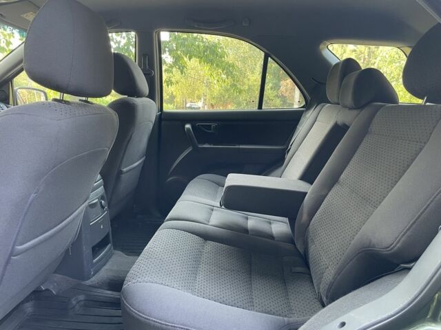 Зелений Кіа Соренто, об'ємом двигуна 2.4 л та пробігом 274 тис. км за 3999 $, фото 10 на Automoto.ua