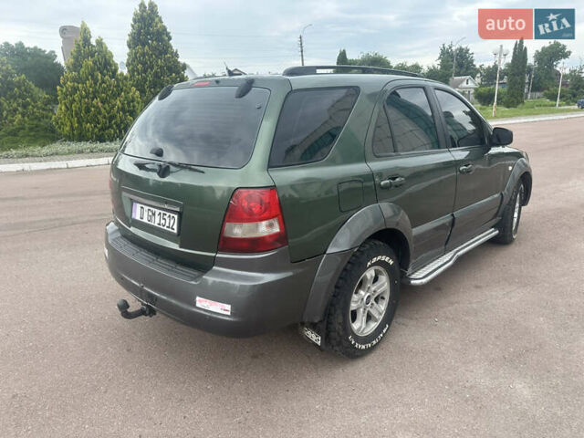 Зеленый Киа Соренто, объемом двигателя 2.5 л и пробегом 350 тыс. км за 4300 $, фото 3 на Automoto.ua