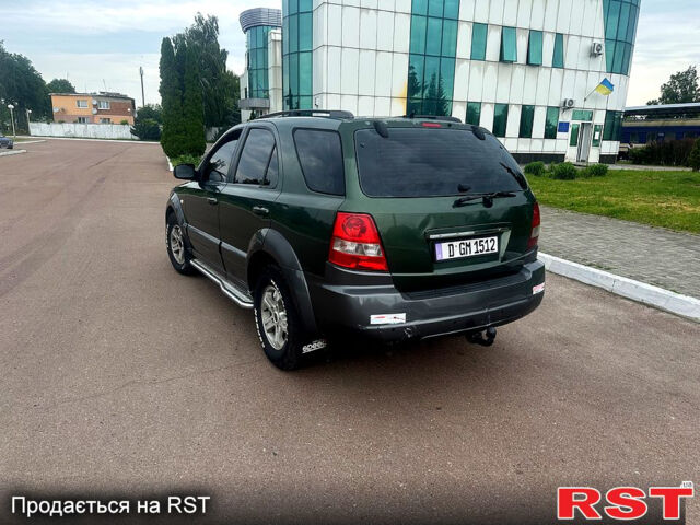 Зеленый Киа Соренто, объемом двигателя 2.5 л и пробегом 250 тыс. км за 4300 $, фото 2 на Automoto.ua