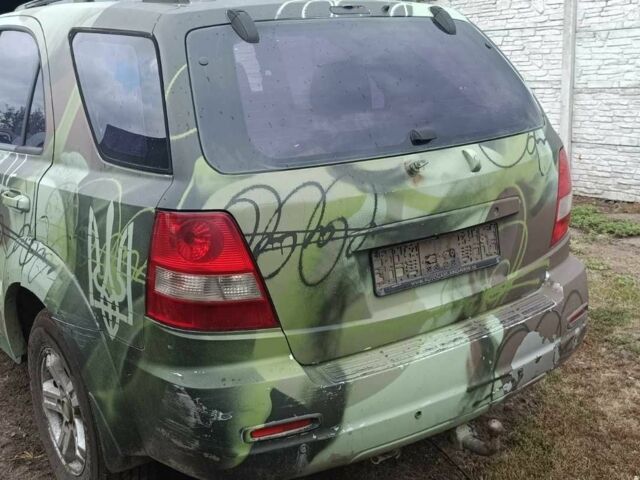 Зеленый Киа Соренто, объемом двигателя 2.5 л и пробегом 300 тыс. км за 1500 $, фото 3 на Automoto.ua
