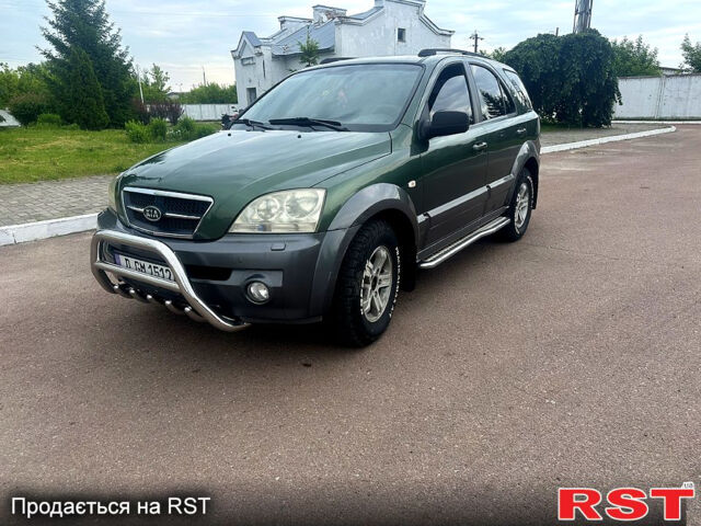 Зеленый Киа Соренто, объемом двигателя 2.5 л и пробегом 250 тыс. км за 4300 $, фото 1 на Automoto.ua