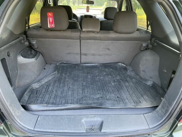 Зелений Кіа Соренто, об'ємом двигуна 2.4 л та пробігом 274 тис. км за 3999 $, фото 12 на Automoto.ua