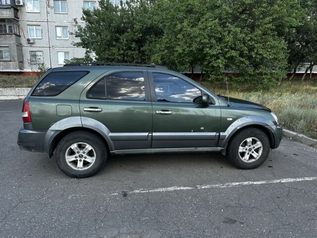 Зеленый Киа Соренто, объемом двигателя 2.5 л и пробегом 252 тыс. км за 5350 $, фото 2 на Automoto.ua