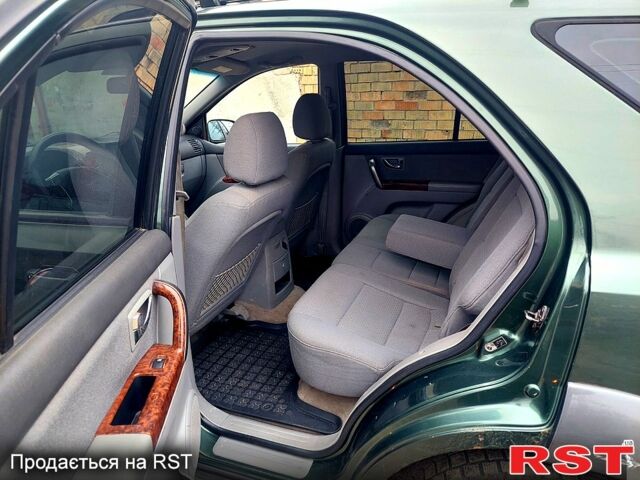 Зелений Кіа Соренто, об'ємом двигуна 2.5 л та пробігом 310 тис. км за 3250 $, фото 4 на Automoto.ua