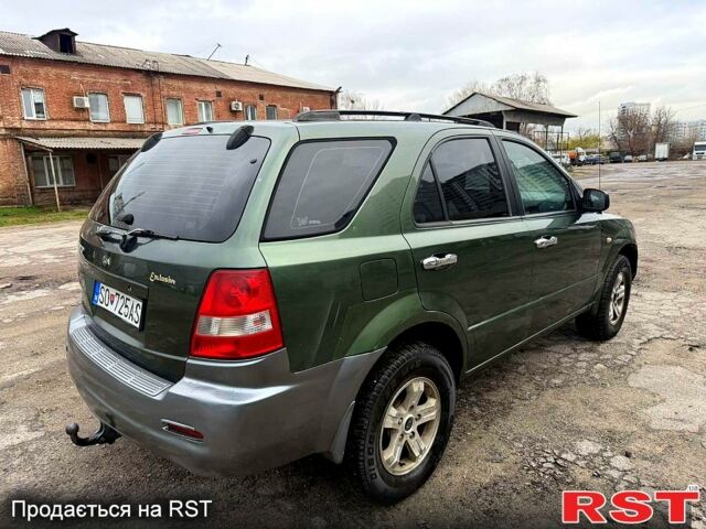 Зеленый Киа Соренто, объемом двигателя 2.5 л и пробегом 256 тыс. км за 3400 $, фото 1 на Automoto.ua