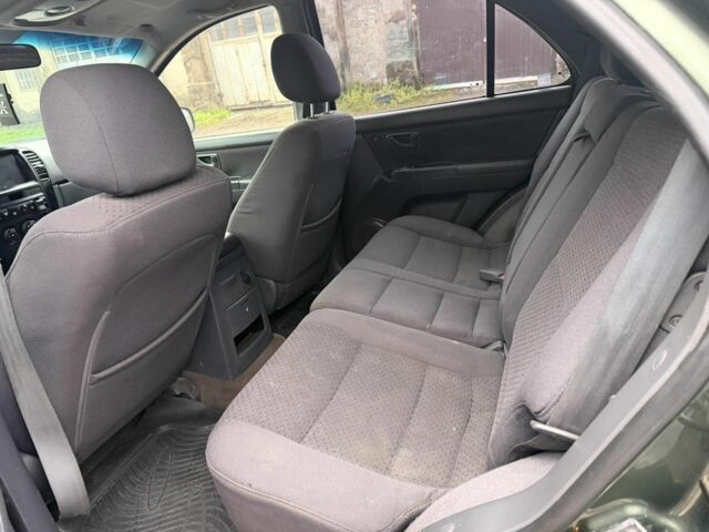 Зеленый Киа Соренто, объемом двигателя 2.5 л и пробегом 256 тыс. км за 3400 $, фото 7 на Automoto.ua