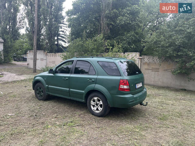 Зеленый Киа Соренто, объемом двигателя 2.5 л и пробегом 245 тыс. км за 4199 $, фото 1 на Automoto.ua