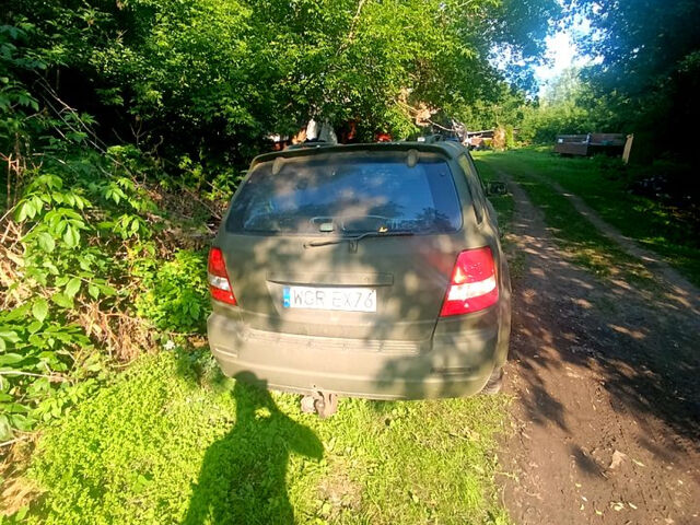 Зелений Кіа Соренто, об'ємом двигуна 2.5 л та пробігом 370 тис. км за 2380 $, фото 2 на Automoto.ua