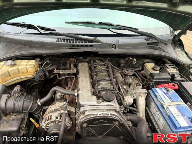 Зеленый Киа Соренто, объемом двигателя 2.5 л и пробегом 256 тыс. км за 3400 $, фото 7 на Automoto.ua