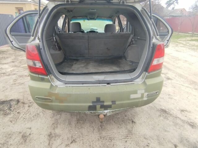 Зеленый Киа Соренто, объемом двигателя 2.5 л и пробегом 350 тыс. км за 3496 $, фото 5 на Automoto.ua