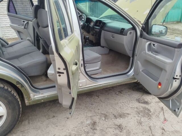 Зеленый Киа Соренто, объемом двигателя 2.5 л и пробегом 350 тыс. км за 3496 $, фото 13 на Automoto.ua