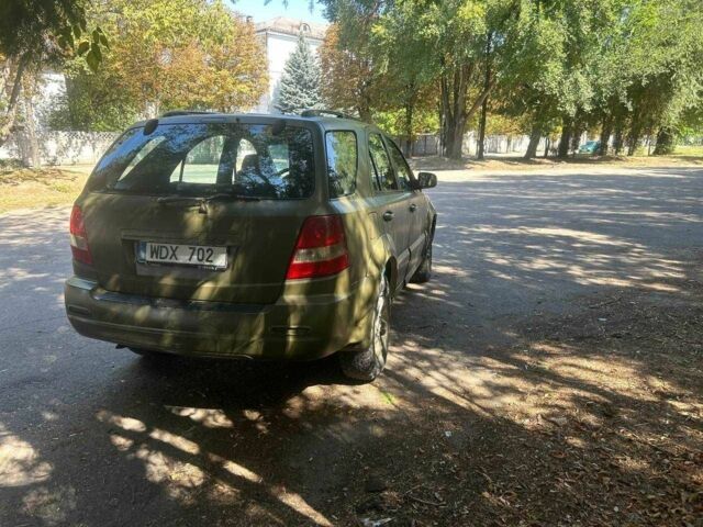 Зеленый Киа Соренто, объемом двигателя 2.5 л и пробегом 200 тыс. км за 3100 $, фото 8 на Automoto.ua