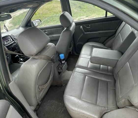 Зеленый Киа Соренто, объемом двигателя 2.5 л и пробегом 259 тыс. км за 3900 $, фото 7 на Automoto.ua