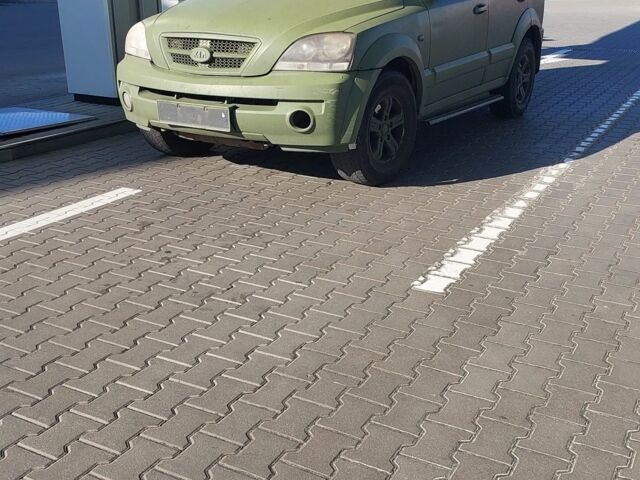 Зеленый Киа Соренто, объемом двигателя 2 л и пробегом 300 тыс. км за 2200 $, фото 5 на Automoto.ua