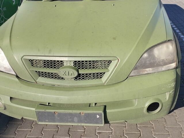 Зеленый Киа Соренто, объемом двигателя 2 л и пробегом 300 тыс. км за 2200 $, фото 4 на Automoto.ua