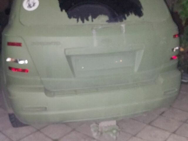 Зеленый Киа Соренто, объемом двигателя 2 л и пробегом 300 тыс. км за 2200 $, фото 3 на Automoto.ua