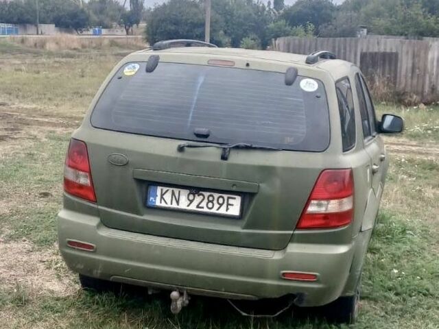 Зеленый Киа Соренто, объемом двигателя 2.5 л и пробегом 260 тыс. км за 3000 $, фото 2 на Automoto.ua
