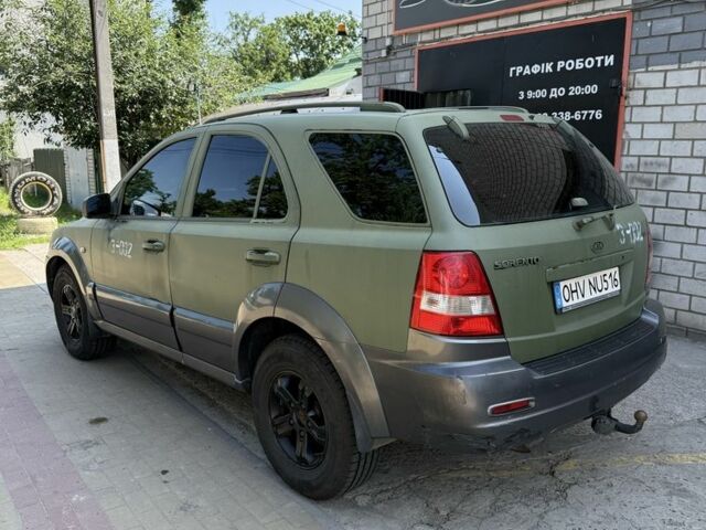 Зеленый Киа Соренто, объемом двигателя 2.5 л и пробегом 245 тыс. км за 4000 $, фото 2 на Automoto.ua