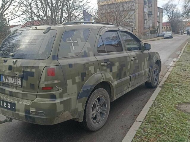 Зеленый Киа Соренто, объемом двигателя 2.5 л и пробегом 300 тыс. км за 4100 $, фото 2 на Automoto.ua