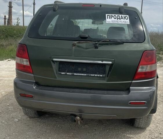 Зеленый Киа Соренто, объемом двигателя 2.5 л и пробегом 259 тыс. км за 3900 $, фото 2 на Automoto.ua